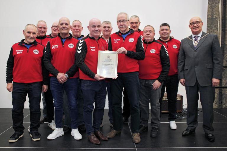Grangetown Walking Football Team being awarded by the Mayor