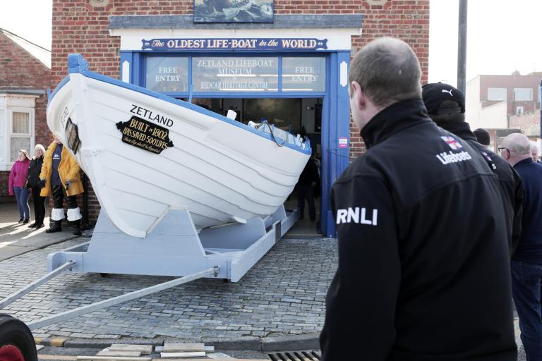front of Zetland Lifeboat Museum with a boat exhibit