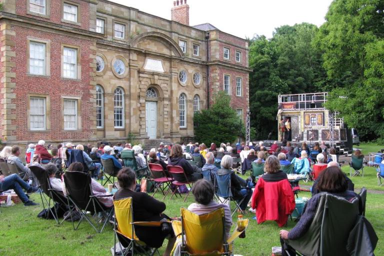 Image of residents watching the open-air theatre in front of front of Kirkleatham museum