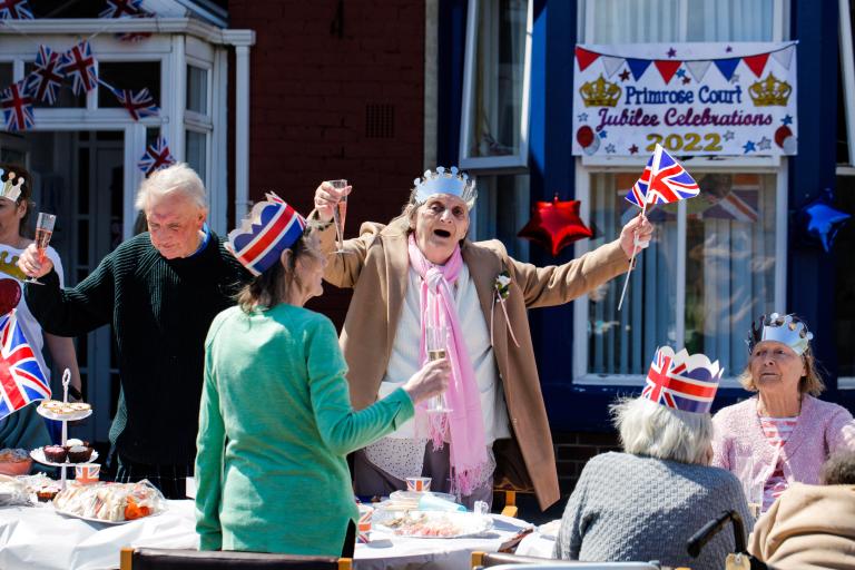 Elderly people dancing and singing at a party at the Primrose care home in South Bank.