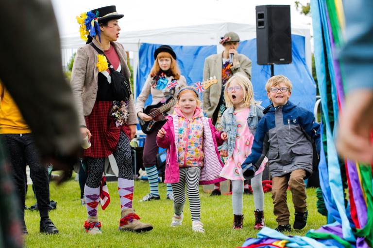 Performers interacting with children at Zetland Park.