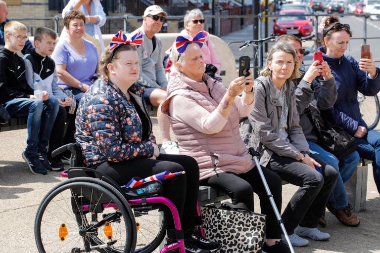 People viewing the Town Crier's declaration at the Redcar Beacon.