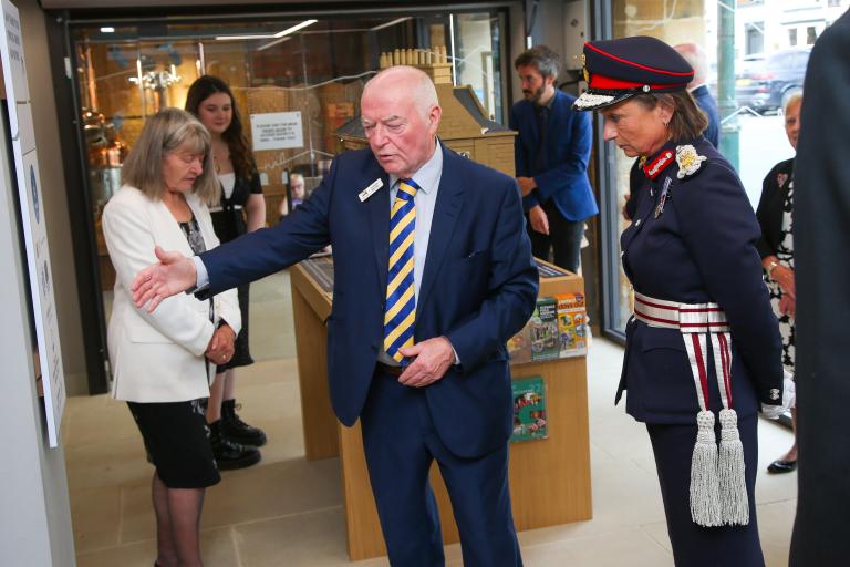 Image of Andy Murray meeting with Lord Lieutenant, Mrs Johanna Ropner, in Guisborough Town Hall. There are a number of onlookers in the background.