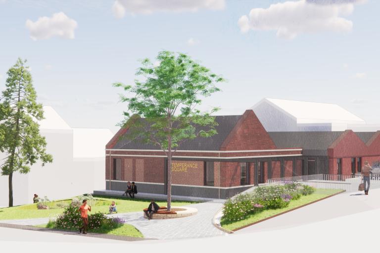 Artists impressions of the proposed design for Temperance Square in Loftus. Image shows a red-brick building with trees in front of its entrance.
