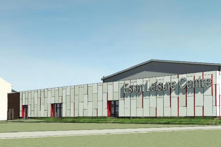 Proposed CGI designs for the new Eston Pool depicting a large, white building with the words Eston Leisure Centre on it. 