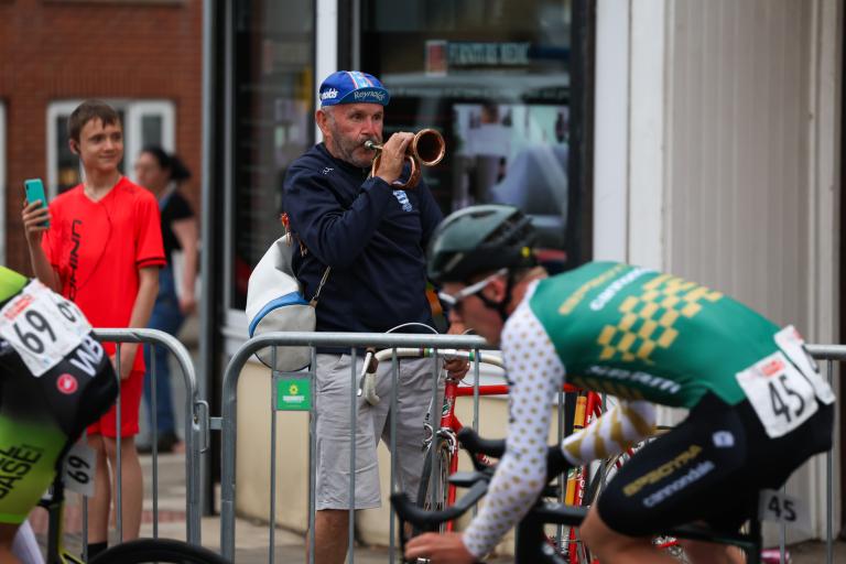 Cyclist passing the crowds at the Circuit Race