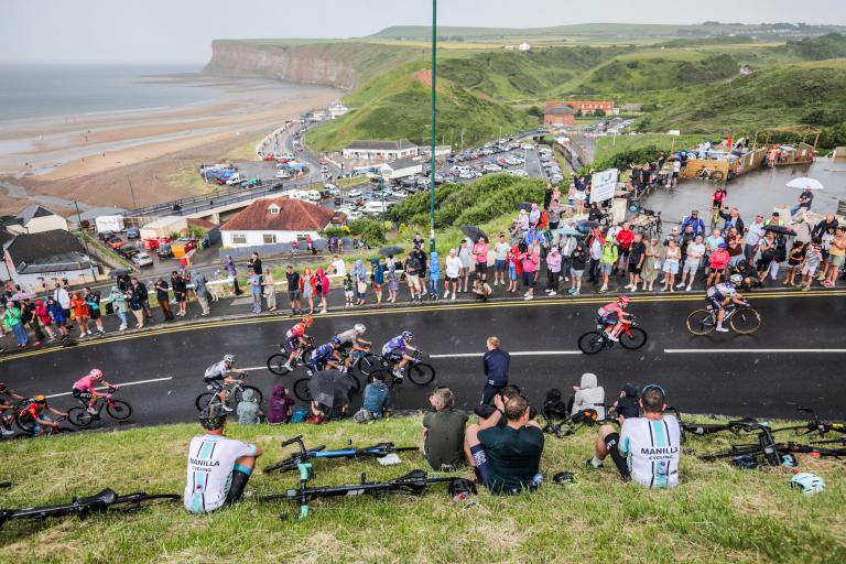 Cyclists at the Road Race going up the Saltburn bank in the rain.