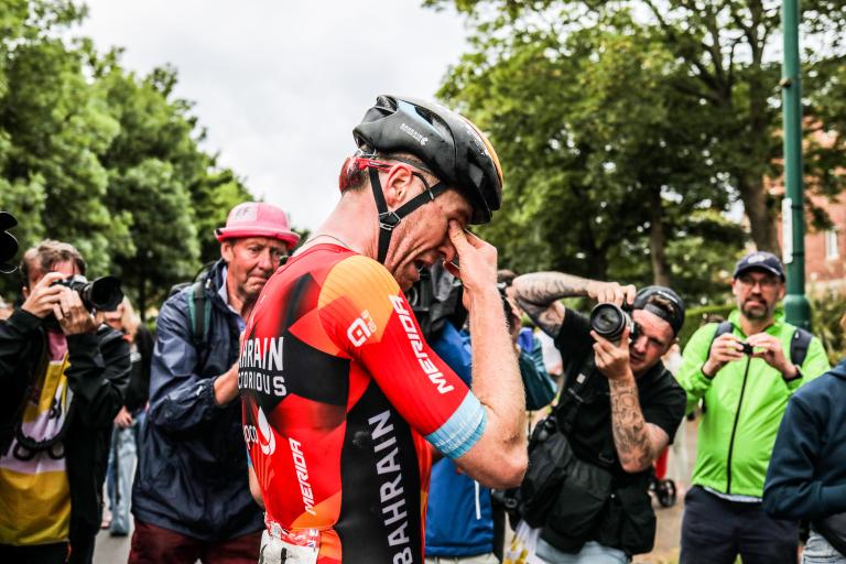 Winner of the Men Road Race wiping his tears of happiness.