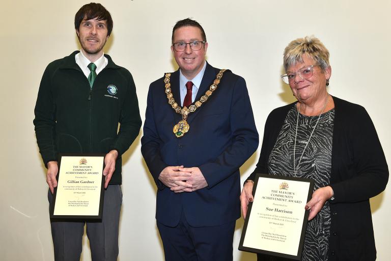 Sue Harrison and a man with the Mayor