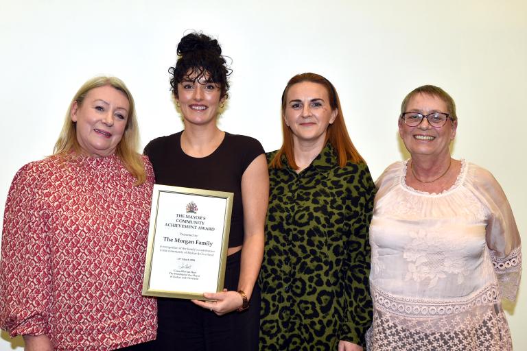 The Morgan Family with their award