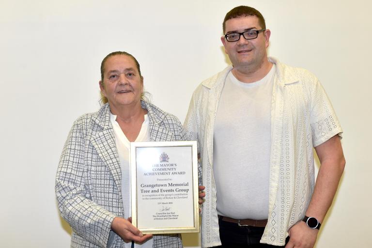 Members of the Grangetown Memorial Tree and Events Group with their award