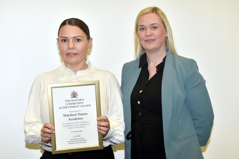 Members of the Stardust Dance Academy with their award