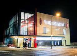 Image of the regent in Redcar at night with signage that reads the regent