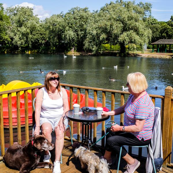 Kath Smart and Jaqui Bray enjoying the sunshine with their dogs, Bob and Oli at Locke Park.